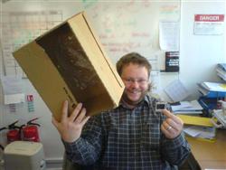 Mark holding up USB hub and box it came in (Custom).JPG
